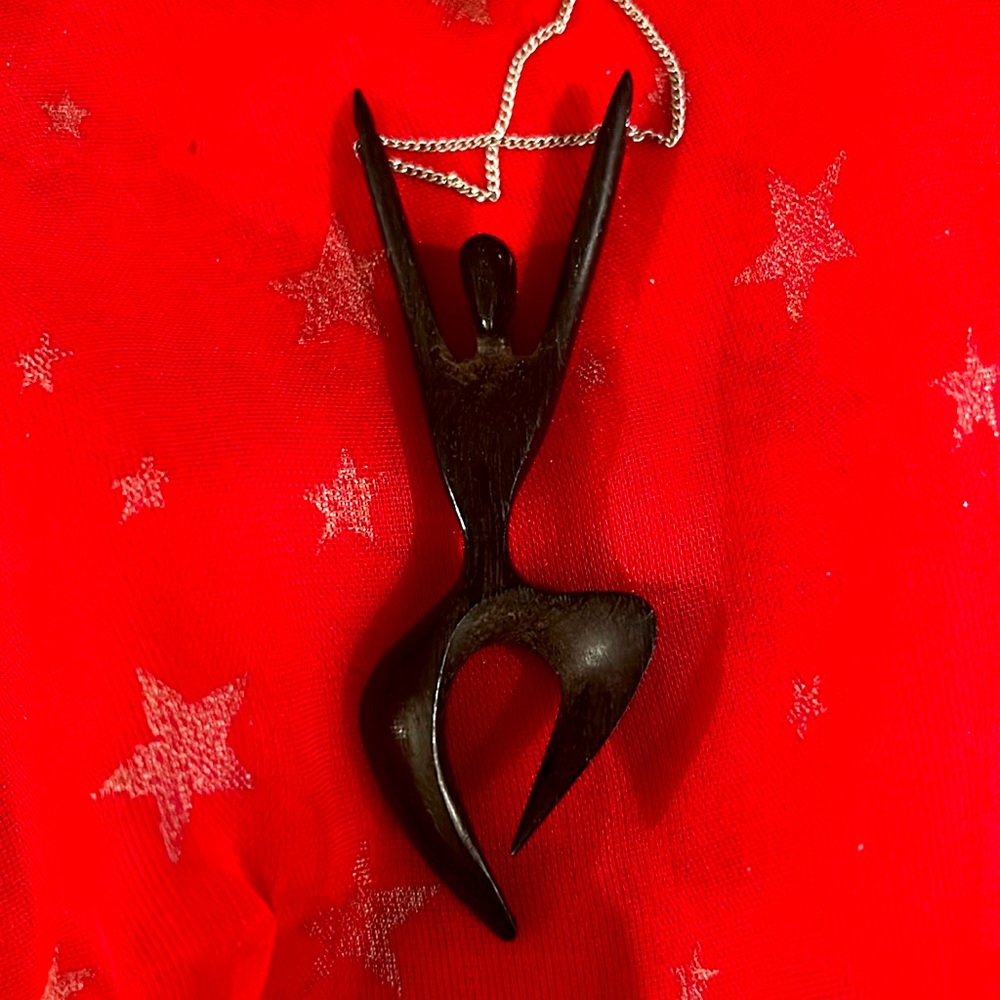 Carved Ebony Dancing Man Pendant